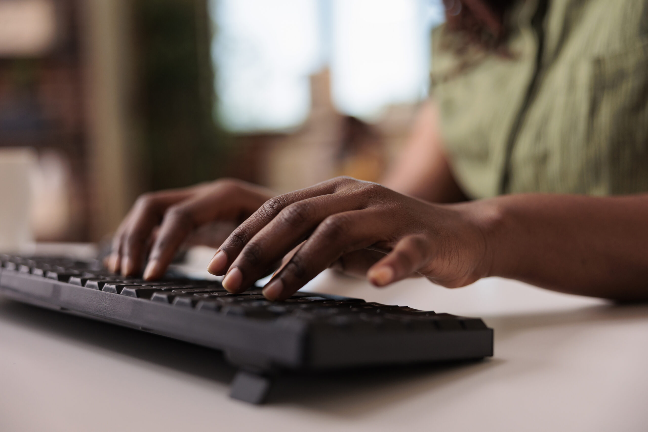 closeup-of-african-american-influencer-writing-pos-2023-11-27-05-26-57-utc-scaled-1